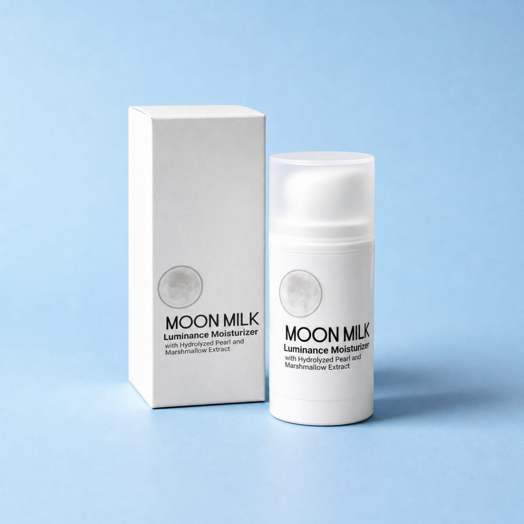 MOON MILK Luminance Moisturizer shown as a white cylindrical bottle with a frosted cap next to its white rectangular box on a light blue background.